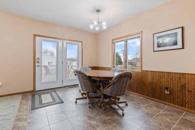 Dining room is open to kitchen and formal seating area | Image 28