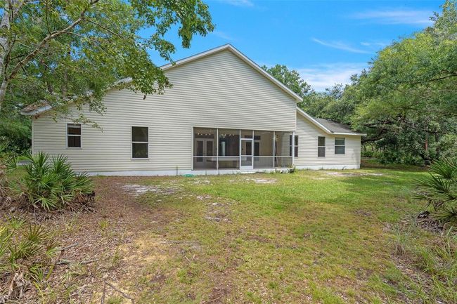 11933 Pasco Trails Blvd, House other with 4 bedrooms, 3 bathrooms and null parking in SPRING HILL FL | Image 34