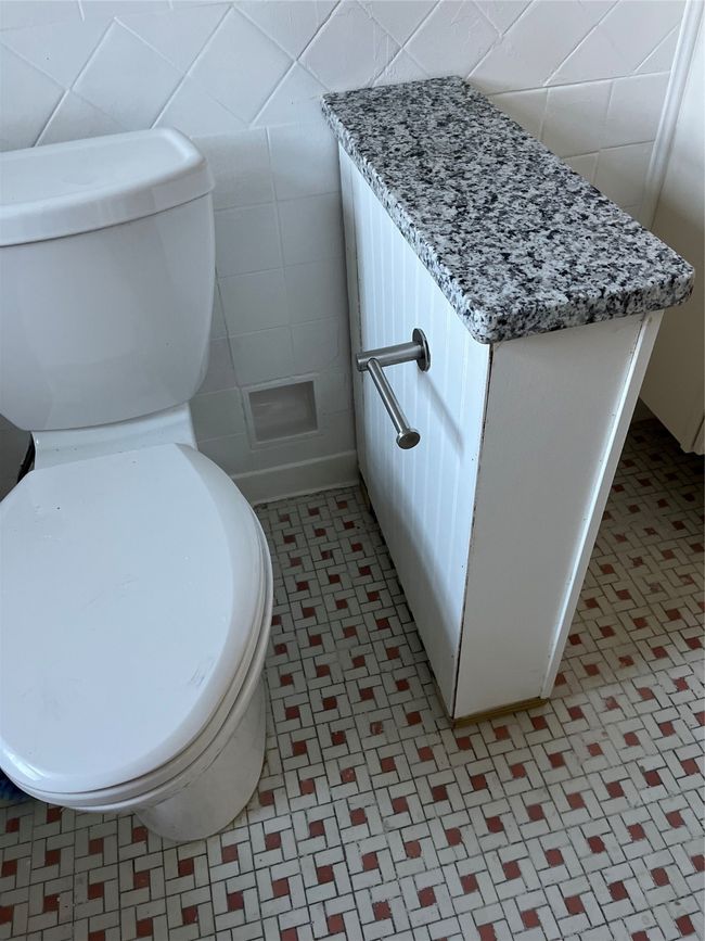 Bathroom featuring tile walls, toilet, tile patterned floors, and vanity | Image 17