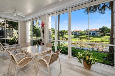 Birdwatchers Dream! Beautiful lake views from the screened-in lanai. | Image 1