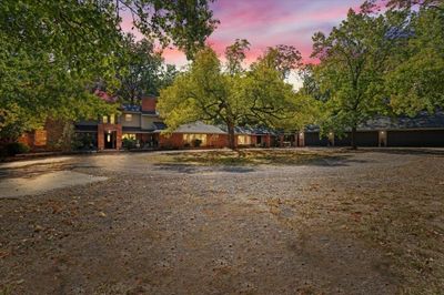 View of yard at dusk | Image 1