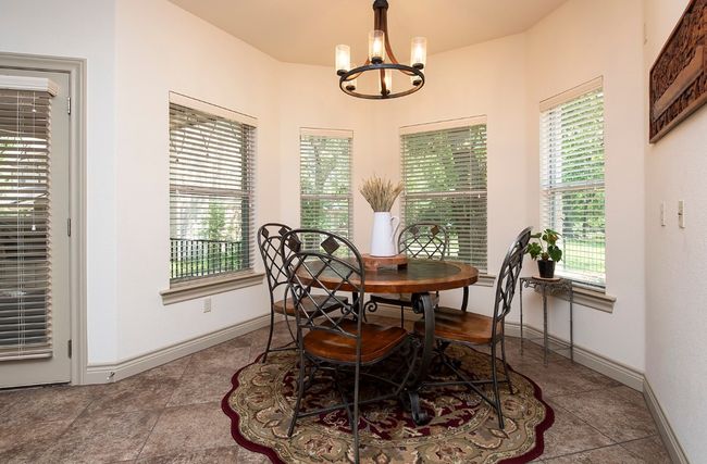 Dining area with close access to back patio for entertaining! | Image 15