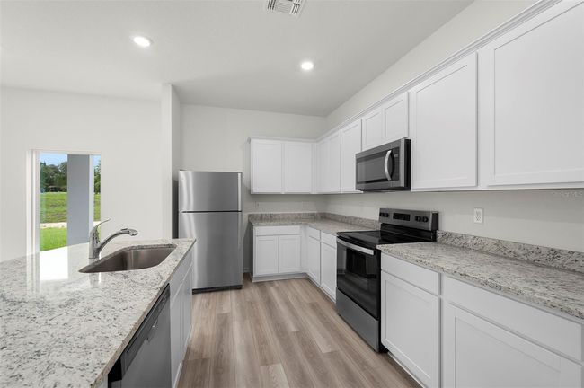 13291 Tula Loop, House other with 4 bedrooms, 3 bathrooms and null parking in ASTATULA FL | Image 6