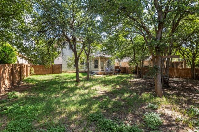 View of fenced backyard | Image 31