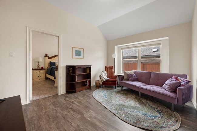 Living area featuring lofted ceiling, wood finished floors, and baseboards | Image 19