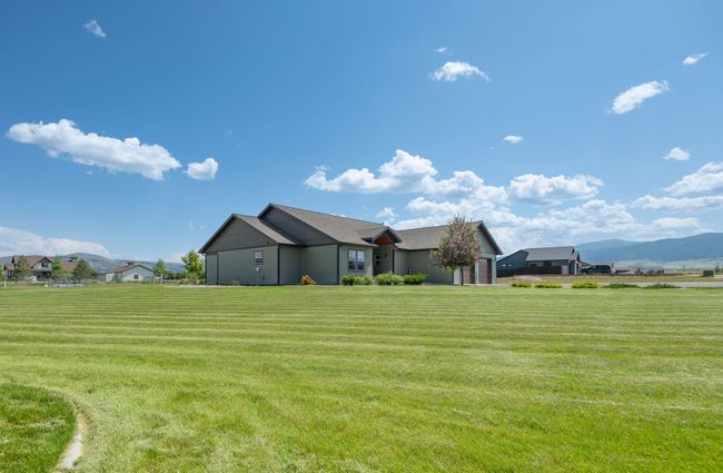 View of green lawn featuring a mountain view | Image 27
