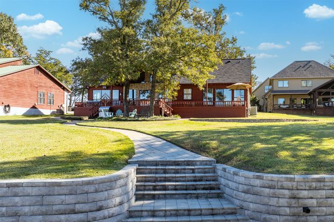 View of yard with a wooden deck | Image 28