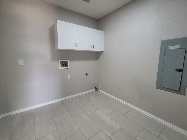Laundry Room w Built-in storage cabinets in the Laundry room | Image 14