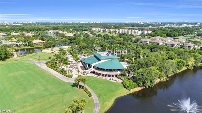 Drone / aerial view with view of golf course and a water view | Image 31