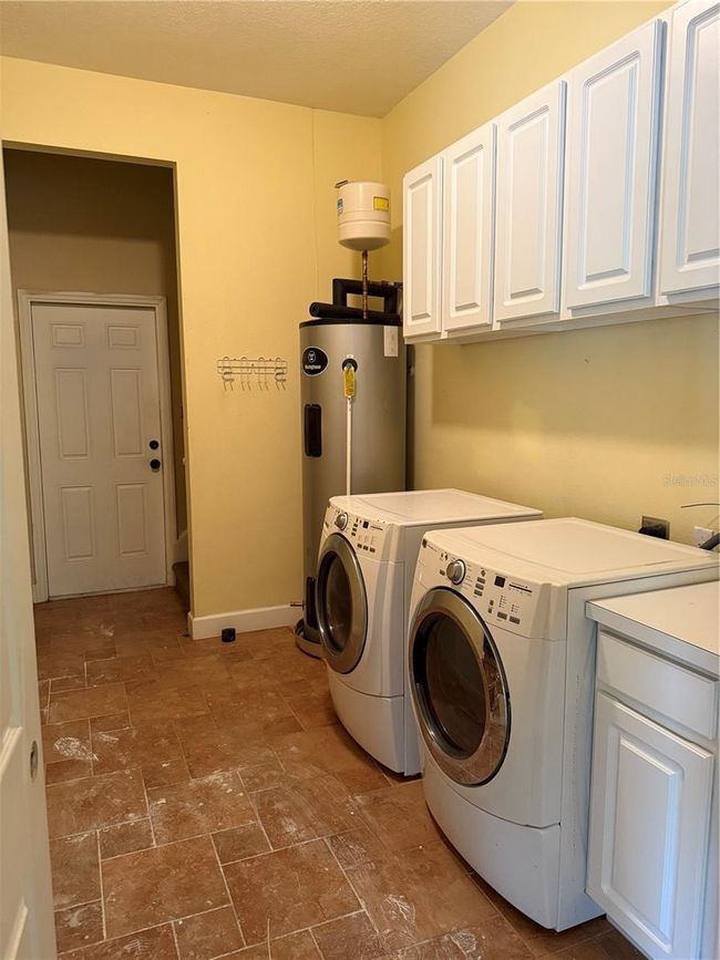 Laundry and garage entrance | Image 30