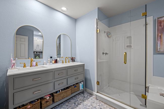 Full bath with a stall shower and double vanity | Image 16