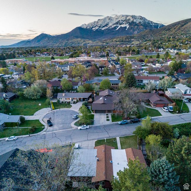 Aerial view at dusk featuring a residential view and a mountain view | Image 33