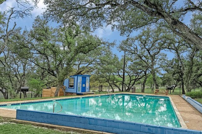 Community pool with access to a tennis and basketball court | Image 30