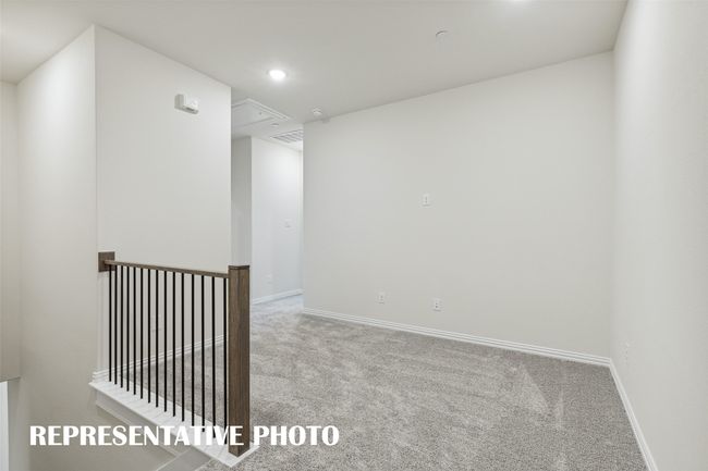Upstairs features a loft area perfect for a home office or a place to curl up with a good book. REPRESENTATIVE PHOTO | Image 8