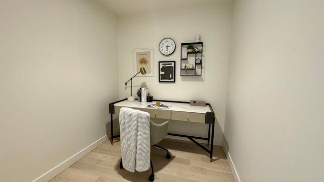 Office space with baseboards and light wood-style flooring | Image 10