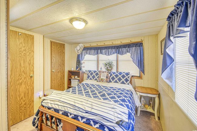 View of carpeted bedroom | Image 21