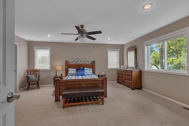 Huge primary bedroom with lake views - fantastic natural light | Image 17