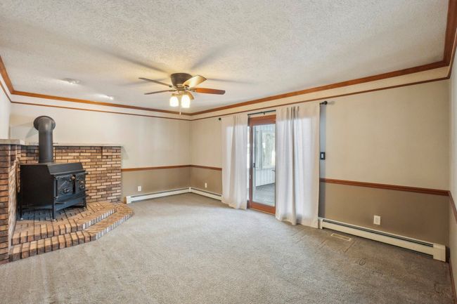 Family Room opens onto screened porch. | Image 4