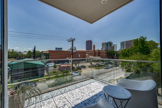 Balcony featuring a view of city | Image 33