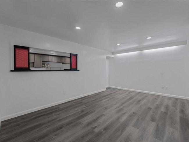 Spare room featuring recessed lighting and wood finished floors | Image 28
