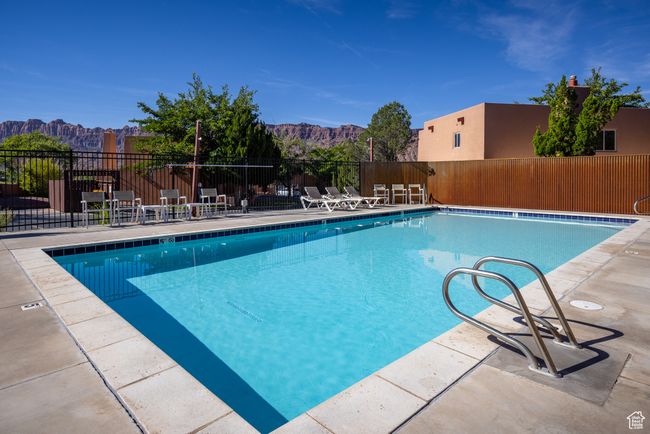 View of pool featuring a patio and a mountain view | Image 38