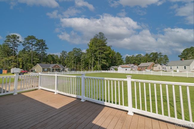 Deck featuring a lawn | Image 24