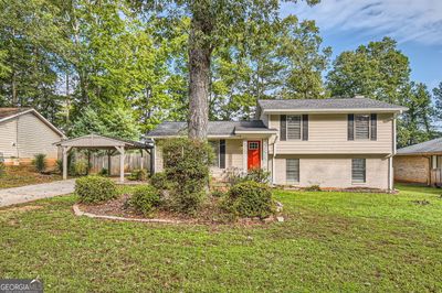 139 Old Mill Trail Sw, House other with 3 bedrooms, 2 bathrooms and 2 parking in Conyers GA | Image 2