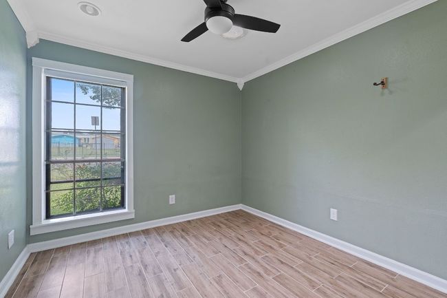Front bedroom used as an office includes light tunnel (can be modified). | Image 28