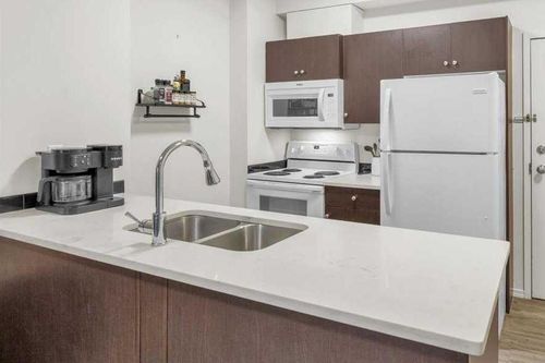 1108-73 Erin Woods Crt Se, Calgary, AB, T2B3V2 | Card Image