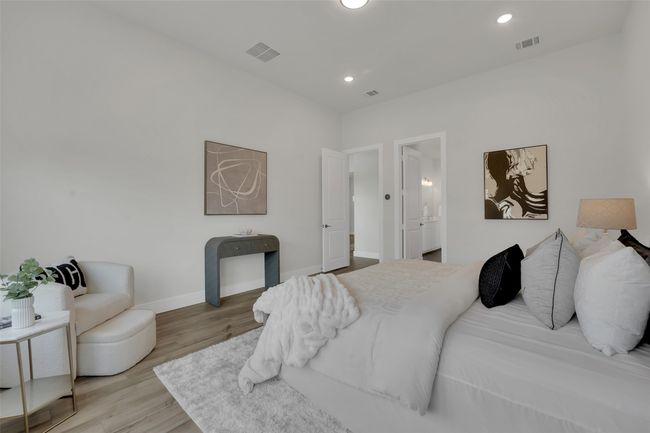 Bedroom featuring recessed lighting, visible vents, light wood finished floors, and baseboards | Image 25