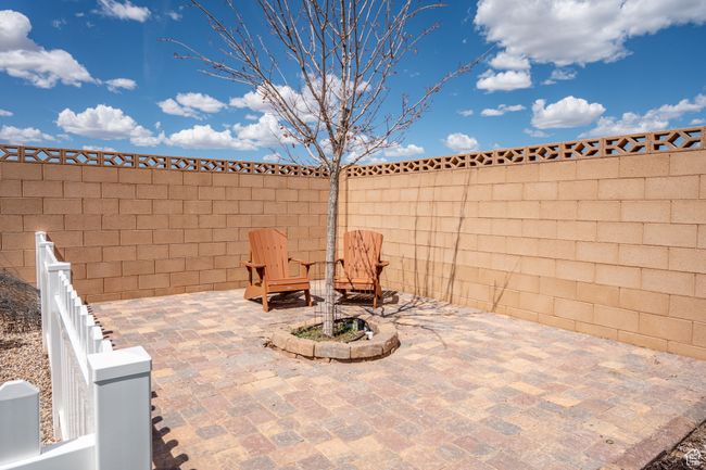 Fenced backyard featuring a patio area | Image 94