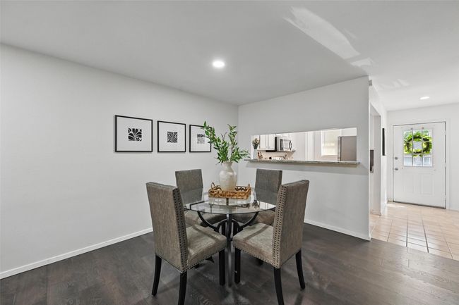 Dining area featuring baseboards, recessed lighting, and wood finished floors | Image 11