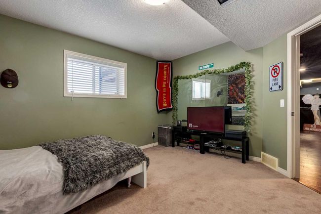 569 Boulder Creek Circle Se, House other with 4 bedrooms, 3 bathrooms and 6 parking in Langdon AB | Image 43