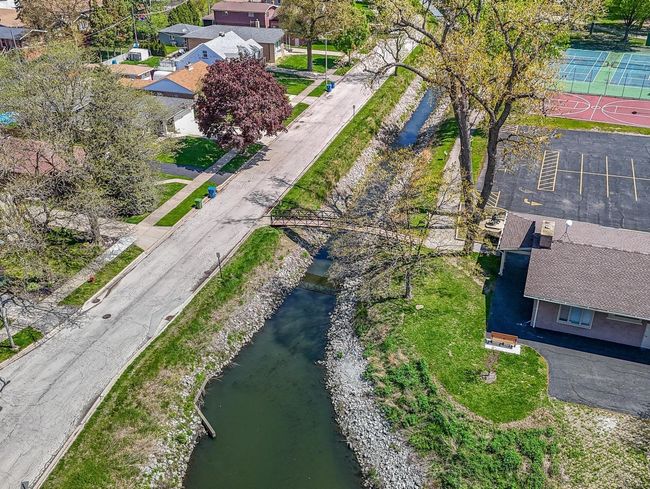 With a view of Oak Lawn Lake/Lake Shore Park! | Image 7