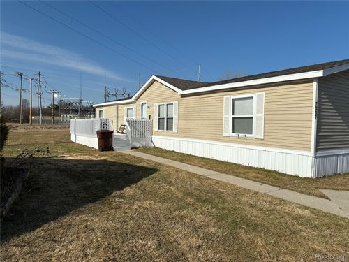 7317 Lads Ct, Alma, MI, 48801-8730 | Card Image
