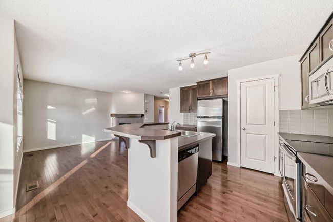 17 Sage Hill Court Nw, Home with 5 bedrooms, 3 bathrooms and 2 parking in Calgary AB | Image 7