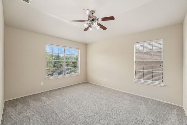Tranquil Primary Suite – Spacious and serene, this bedroom is your personal retreat. | Image 20
