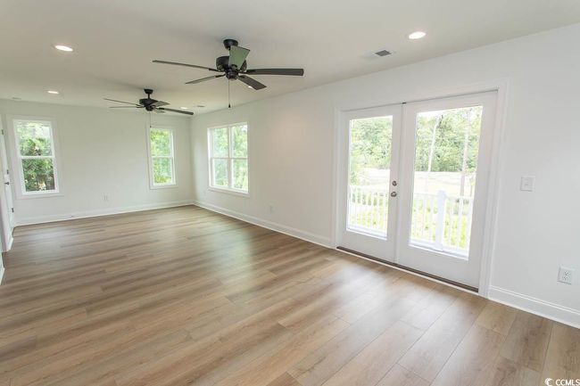Master room featuring light wood-style flooring, baseboards, a ceiling fan, and recessed lighting | Image 25