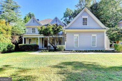 4990 Bowman Park Point, House other with 6 bedrooms, 4 bathrooms and 5 parking in Cumming GA | Image 1