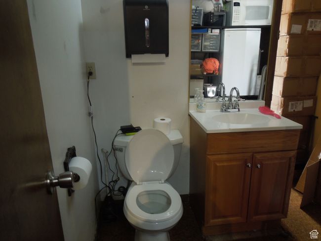 Half bath with toilet and vanity | Image 18