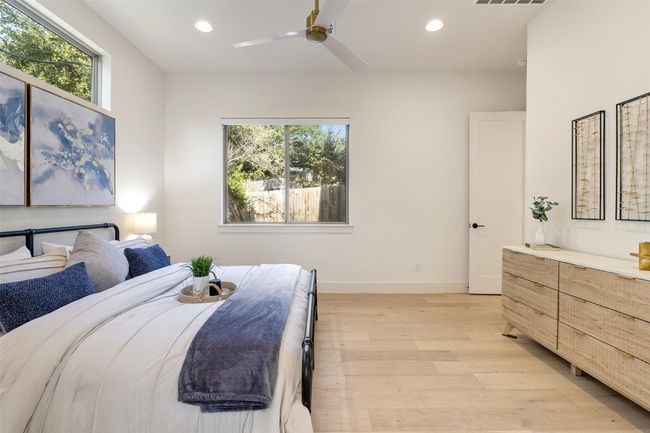 Bedroom with recessed lighting, multiple windows, light wood-style flooring, and baseboards | Image 16
