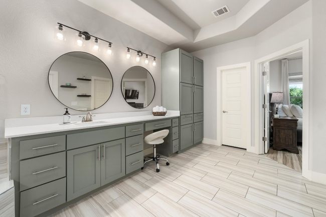 Full bath featuring decorator lighting and mirrors. | Image 19