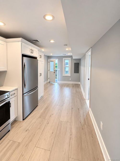 2w-218 Sunrise, Hempstead, NY, 11570 | Card Image