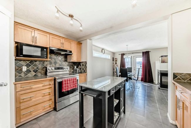 66 Evansbrooke Terr Nw, House other with 5 bedrooms, 4 bathrooms and 4 parking in Calgary AB | Image 8
