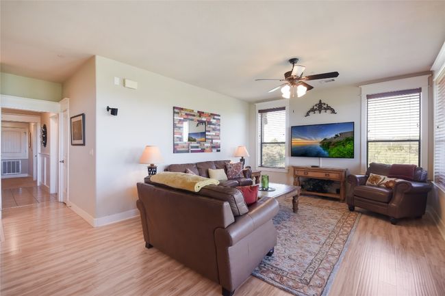 Open Living Area with wood finished flooring | Image 6