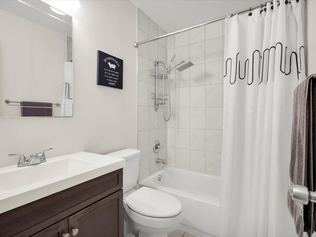 Bathroom with vanity and shower / bath combo with shower curtain | Image 21