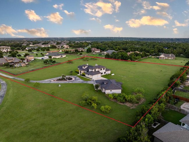 Aerial perspective of suburban area with property boundaries highlighted | Image 37