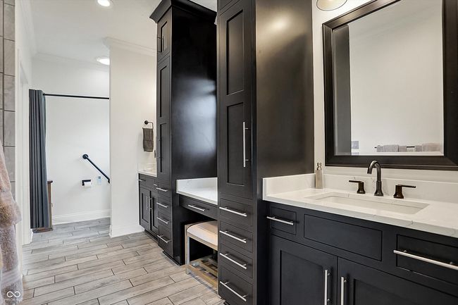 full bathroom with baseboards, recessed lighting, wood finished floors, vanity, and ornamental molding | Image 28