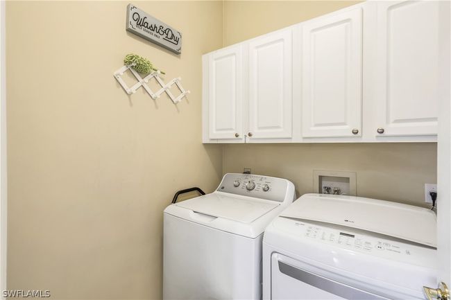 Laundry roomhas extra storage. | Image 26