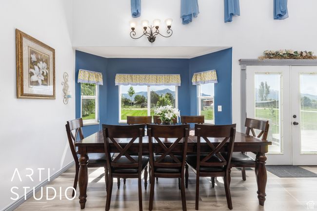 Dining space featuring french doors and plenty of natural light | Image 15